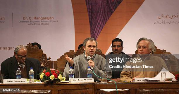 Jammu & Kashmir Chief Minister, Omar Abdullah with Union Rural Development Minister, Jairam Ramesh and C. Rangarajan, chairman, Economic Advisory...