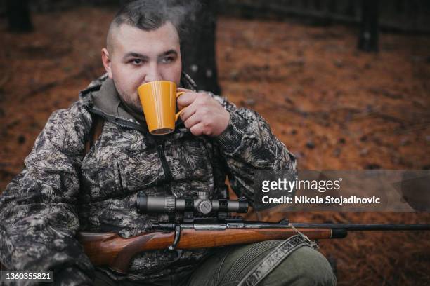 the hunter drinks tea - autumn frost stock pictures, royalty-free photos & images
