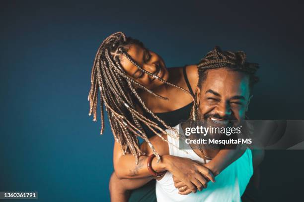 afro coople in studio - locs hairstyle stock pictures, royalty-free photos & images