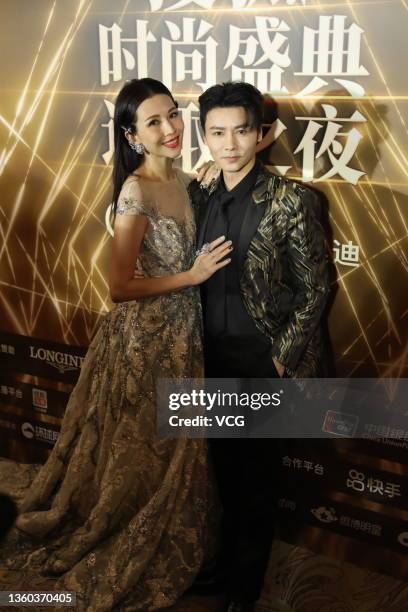 Actress Ada Choi Siu-fan and her husband Max Zhang Jin attend 2021 Sohu Fashion Awards on December 22, 2021 in Beijing, China.