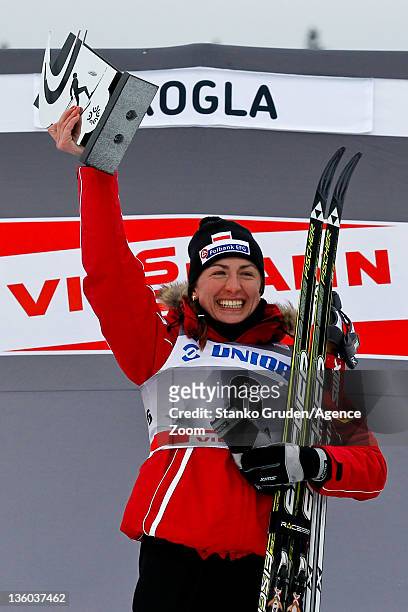 Justyna Kowalczyk of Poland takes 1st place during the FIS Cross Country World Cup Women's 10km Mass Start on December 17, 2011 in Rogla, Slovenia.