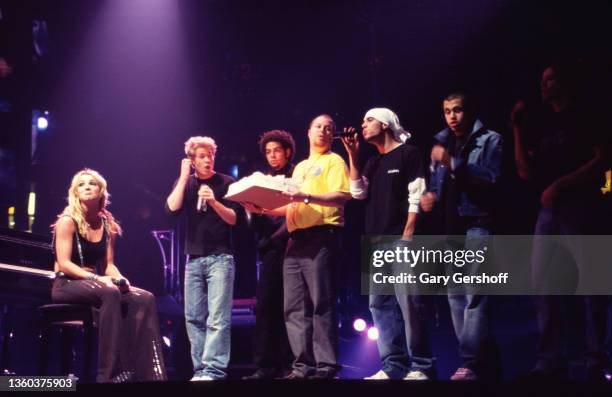 American Pop singer Britney Spears is presented with birthday cake, onstage during her 'Dream Within a Dream' tour, at Continental Airlines Arena ,...