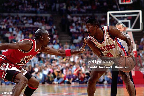 Michael Jordan of the Chicago Bulls defends against Joe Dumars of the Detroit Pistons during an NBA game in Detroit, Michigan. NOTE TO USER: User...