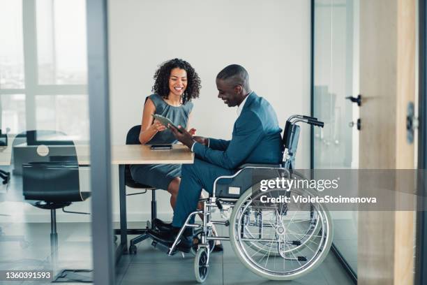 business partners in meeting. - disability working stockfoto's en -beelden