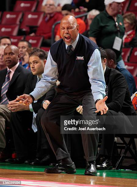 Head coach Mike Jarvis of the Florida Atlantic Owls reacts to first half action against the Miami Hurricanes at the Orange Bowl Basketball Classic on...