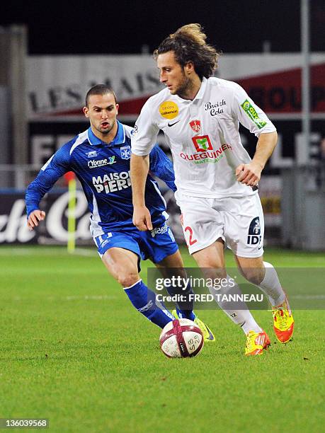 Auxerre's Israeli forward Ben Sahar vies with Brest's defender Paul Baysse during their French L1 football match Brest versus Auxerre on December 17,...