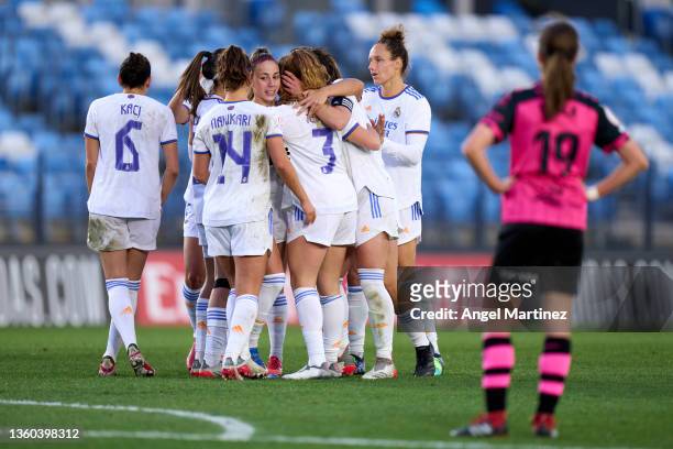 Athenea del Castillo of Real Madrid celebrates with team mates after scoring their team's third goal during the Primera Iberdrola match between Real...