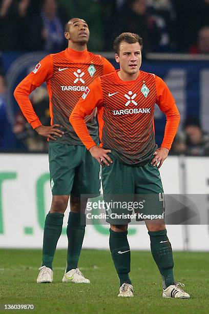 Naldo and Philipp Bargfrede of Bremen look dejected after the forth goal of Schalke during the Bundesliga match between FC Schalke 04 and SV Werder...
