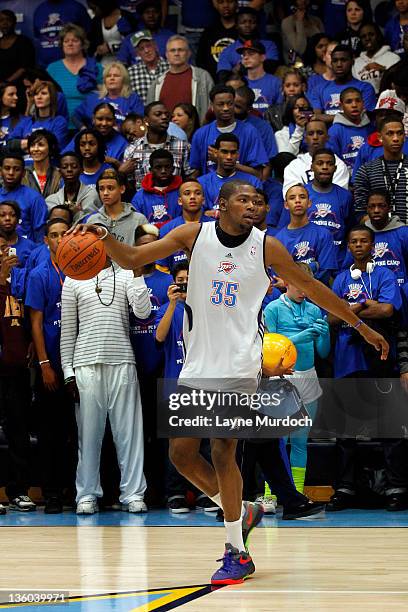 Kevin Durant of the Oklahoma City Thunder takes part in an open scrimmage on December 16, 2011 at Putnam City West High School in Oklahoma City,...