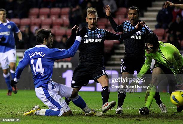 Jordi Gomez of Wigan Athletic scores an equalising goal during the Barclays Premier League match between Wigan Athletic and Chelsea at the DW Stadium...