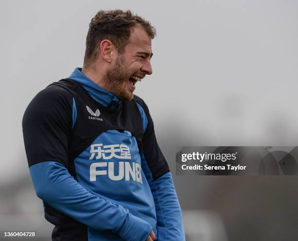 Ryan Fraser laughs during the Newcastle United Training Session at the Newcastle United Training Centre on December 22, 2021 in Newcastle upon Tyne,...