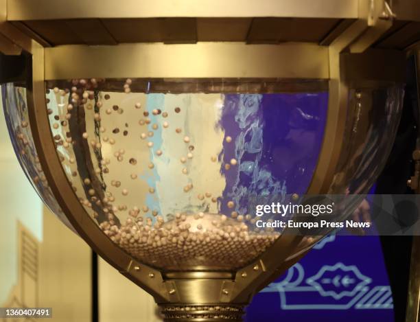 Lottery drum during the celebration of the Extraordinary Draw of the Christmas Lottery 2021, at the Royal Theatre of Madrid, on 22 December, 2021...