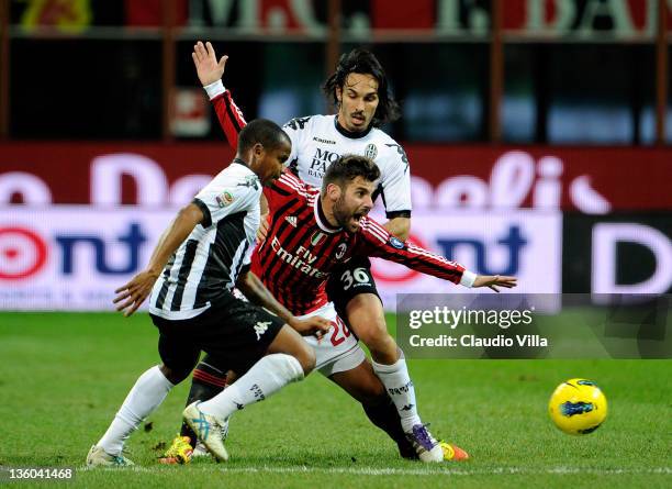 Antonio Nocerino of AC Milan and Francesco Bolzoni of AC Siena compete for the ball during the Serie A match between AC Milan and AC Siena at Stadio...