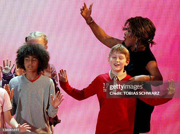 Singer Tina Turner sings with children during the charity gala "Ein Herz fuer Kinder" on December 17, 2011 in Berlin. This gala is the German major...