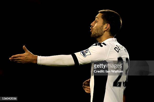 Clint Dempsey of Fulham gestures during the Barclays Premier League match between Fulham and Bolton Wanderers at Craven Cottage on December 17, 2011...