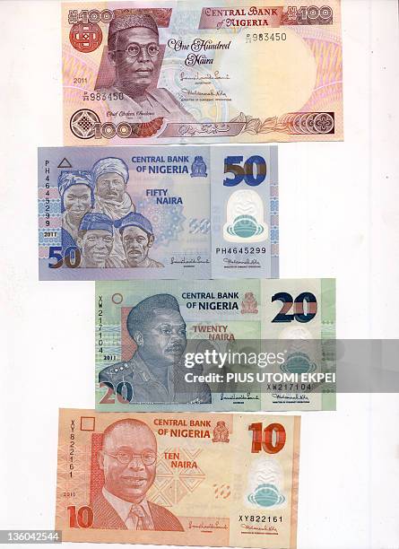 View dated on December 21, 2011 in Lagos show Nigerian bank notes, the Naira in different denominations. AFP PHOTO / PIUS UTOMI EKPEI