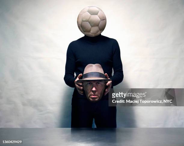 portrait of a man with his head replaced by a soccer ball. - headless man - fotografias e filmes do acervo