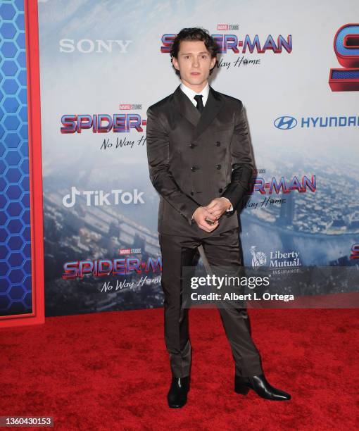 Tom Holland attends Sony Pictures' "Spider-Man: No Way Home" Los Angeles Premiere held at The Regency Village Theatre on December 13, 2021 in Los...