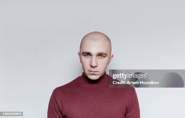 ironical portrait of bald head man in turtleneck - irony fotografías e imágenes de stock