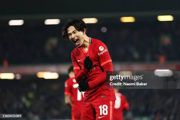 Takumi Minamino of Liverpool celebrates scoring his teams third goal of the game during the Carabao Cup Quarter Final match between Liverpool and...