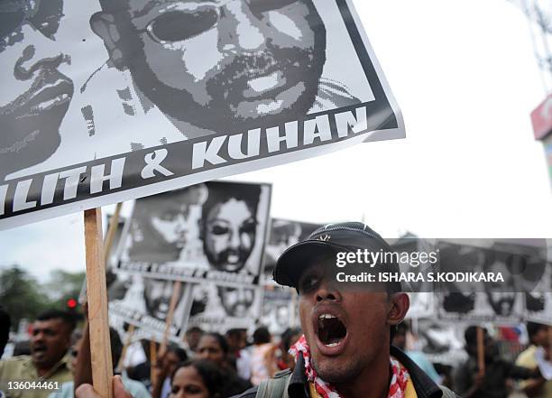 Sri Lanka's Marxist Peoples Party supporters shouts slogans during a demonstration in Colombo on December 21 demanding the government take action to...