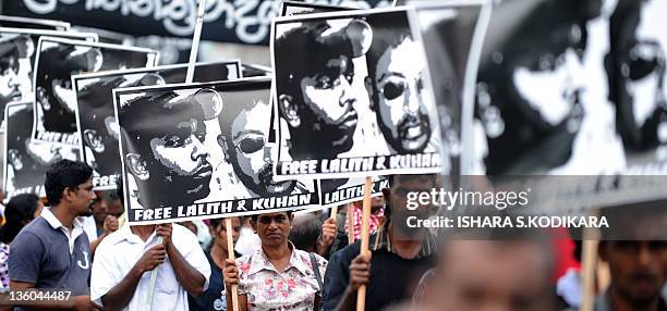Sri Lanka's Marxist Peoples Party supporters shout slogans during a demonstration in Colombo on December 21 demanding the government take action to...