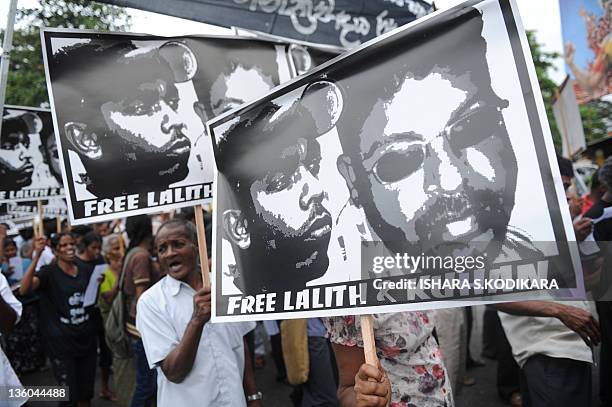Sri Lanka's Marxist Peoples Party supporters shout slogans during a demonstration in Colombo on December 21 demanding the government take action to...