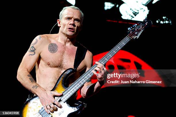 Flea of Red Hot Chili Peppers performs at Palacio de los Deportes on December 17, 2011 in Madrid, Spain.