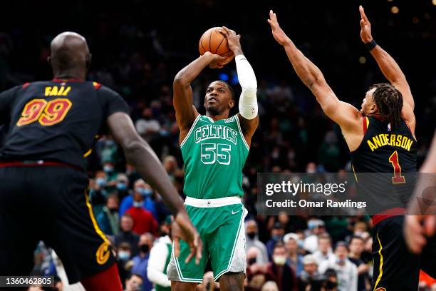 Justin Anderson of the Cleveland Cavaliers attempts to block Joe Johnson of the Boston Celtics shot during the fourth quarter of the game against the...