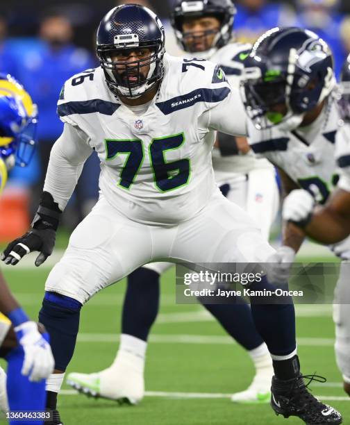 Duane Brown of the Seattle Seahawks sets a block in the game against the Los Angeles Rams at SoFi Stadium on December 19, 2021 in Inglewood,...