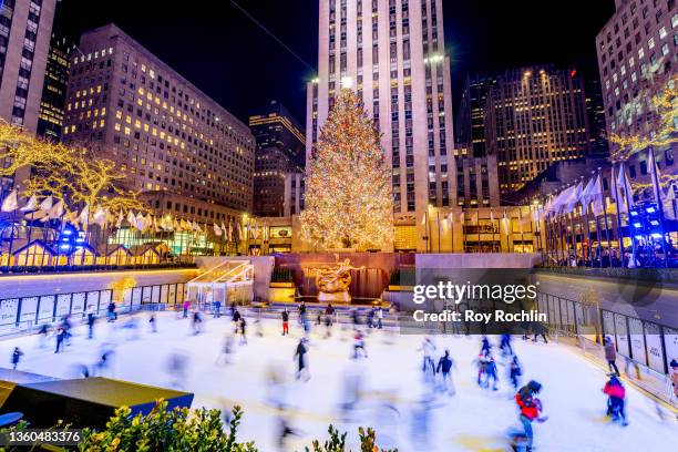 View of the Rockefeller Plaza ice skating rink with the annual Christmas tree on December 22, 2021 in New York City.