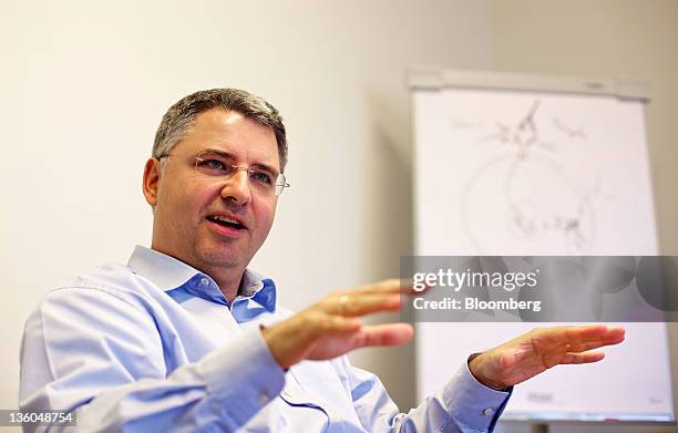 Severin Schwan, chief executive officer of Roche Holding AG, gestures during an interview at the company's headquarters in Basel, Switzerland, on...