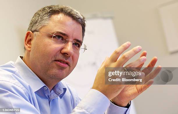 Severin Schwan, chief executive officer of Roche Holding AG, gestures during an interview at the company's headquarters in Basel, Switzerland, on...