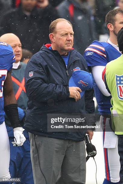 Head coach Chan Gailey of the Buffalo Bills stands for the playing of the anthem before their NFL game against the Miami Dolphins at Ralph Wilson...