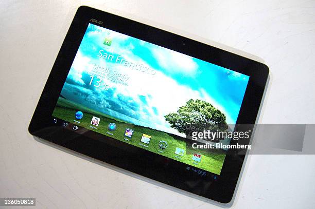 An Asustek Computer Inc. Eee Pad Transformer Prime tablet computer is arranged for a photograph in San Francisco, California, U.S., on Tuesday, Dec....