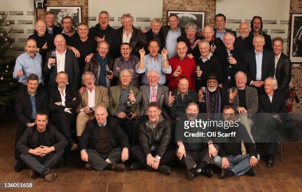 Former fleet street photographers reunite for a Christmas lunch at the Frontline Club on December 17, 2011 in London, England. The reunion, which...