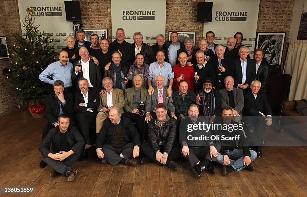 Former fleet street photographers reunite for a Christmas lunch at the Frontline Club on December 17, 2011 in London, England. The reunion, which...