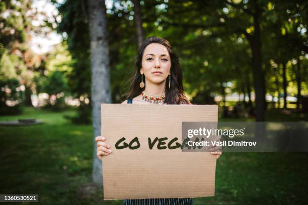 vegan diet is the future - vegan activist stock pictures, royalty-free photos & images