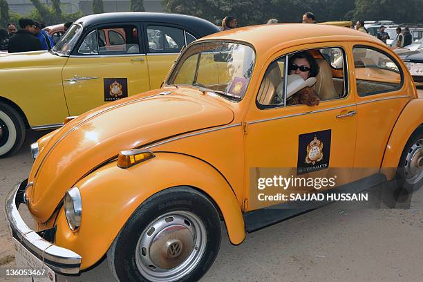 Era Volkswagen Beetle during a vintage car parade in New Delhi on December 18, 2011. More than fifty vintage automobiles and motorcycles were on...