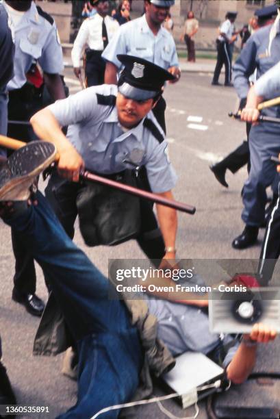 Police attacking a protester at an anti-Vietnam war demonstration in 1970 May 9, 1970 Washington, DC
