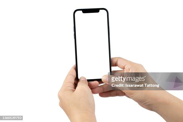 smartphone in female hands taking photo isolated on white blackground - digitalkamera bildschirm stock-fotos und bilder