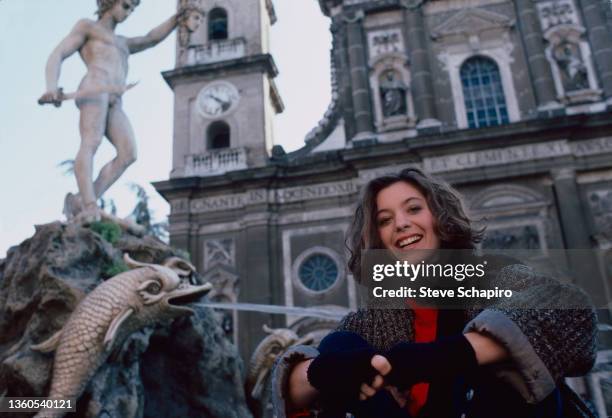 Portrait of American musician and actress Moon Zappa , in costume for the film 'National Lampoon's European Vacation' , as she poses on location,...