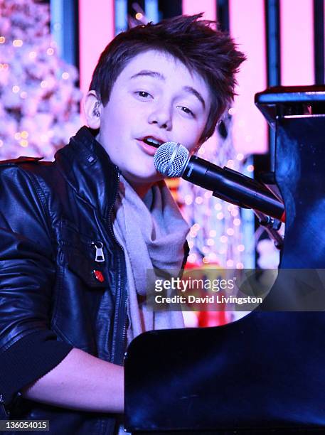 Pop singer Greyson Chance performs on stage at The Salvation Army's 2nd annual "Rock the Red Kettle" event at Universal CityWalk on December 17, 2011...