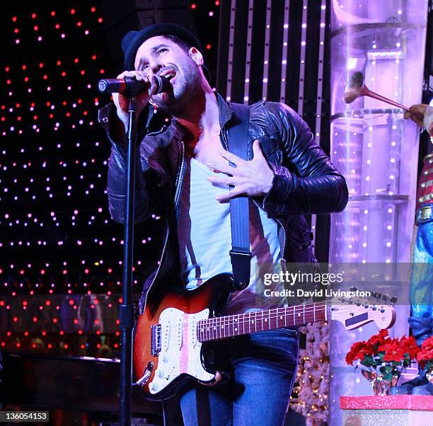 Singer Michael Bruno of Honor Society performs on stage at The Salvation Army's 2nd annual "Rock the Red Kettle" event at Universal CityWalk on...