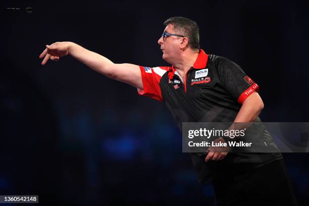 Mensur Suljović of Serbia in action during his Second Round Match against Alan Soutar of Scotland during Day Nine of The William Hill World Darts...