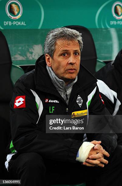 Head coach Lucien Favre of Moenchengladbach is seen prior to the DFB Cup round of sixteen match between Borussia Moenchengladbach and FC Schalke 04...