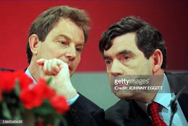 Tony Blair , opposition Labour party leader,and Gordon Brown, shadow chancellor, confer 10 April at an campaign press conference. Asked about latest...