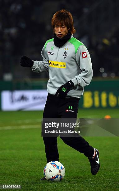 Yuki Otsu of Moenchengladbach warms up prior to the DFB Cup round of sixteen match between Borussia Moenchengladbach and FC Schalke 04 at Borussia...