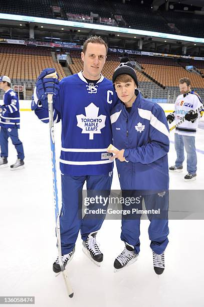 Singer Justin Bieber is home for the Holidays and takes the ice as he skates with Toronto Maple Leaf's Captain Dion Phaneuf at the Air Canada Centre...