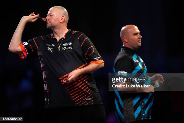 Raymond van Barneveldof Netherlands in action during his Second Round Match against Rob Cross of England during Day Nine of The William Hill World...